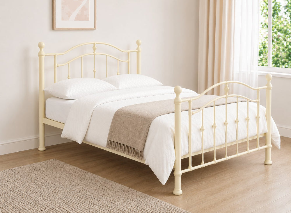 Double copper metal bed frame with curved headboard and footboard.