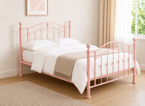 Double light pink metal bed frame with curved headboard and footboard.