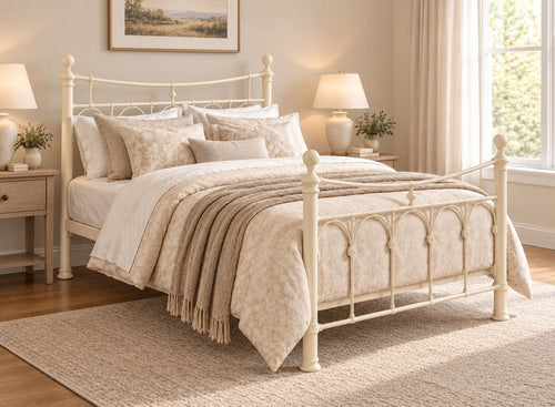 Gamford Double Metal Bed Frame in Cream with ornate headboard and footboard.