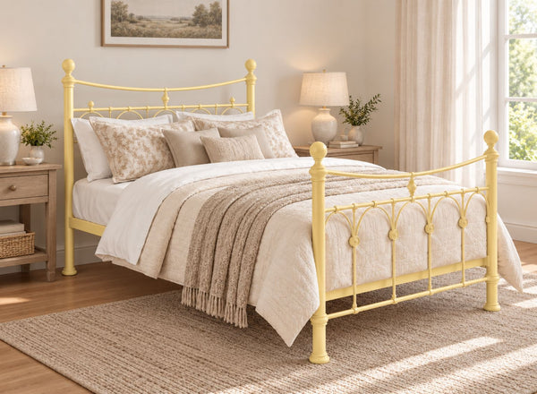Gamford Double Metal Bed Frame in Yellow with ornate headboard and footboard.