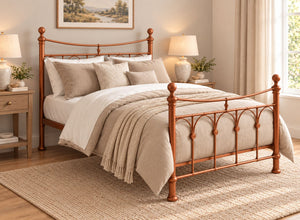 Gamford Double Metal Bed Frame in Copper with ornate headboard and footboard.