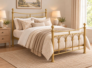 Gamford Double Metal Bed Frame in Goldwith ornate headboard and footboard.