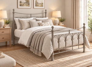 Gamford Double Metal Bed Frame in Silver with ornate headboard and footboard.