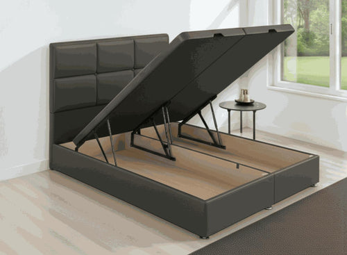 King size grey faux leather end lift ottoman bed with a padded headboard.
