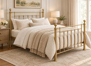 Libham Double Gold metal bed frame with ornate headboard and footboard.