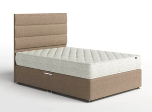 Extra Firm One mattress shown on angle on divan