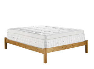 'The Pillowtop One' Mattress Shown in King Size on a wooden base