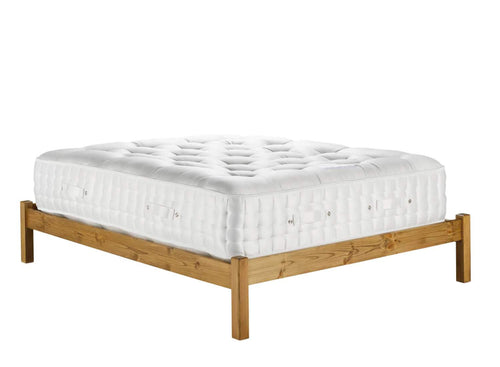 'The Premium One' 12500 Pocket Sprung Mattress on a wooden base