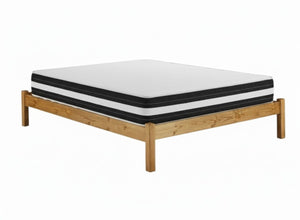 'The Memory One' mattress shown on a wooden base