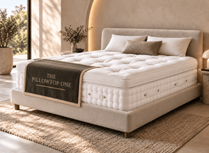 The Pillowtop One sitting on an upholstered bed frame