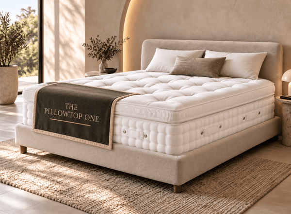 The Pillowtop One sitting on an upholstered bed frame