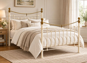 Victoria Double Cream Metal Bed Frame with brass accents.