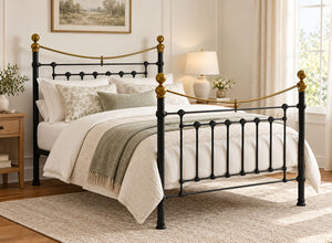 Victoria Double Black Metal Bed Frame with brass accents.
