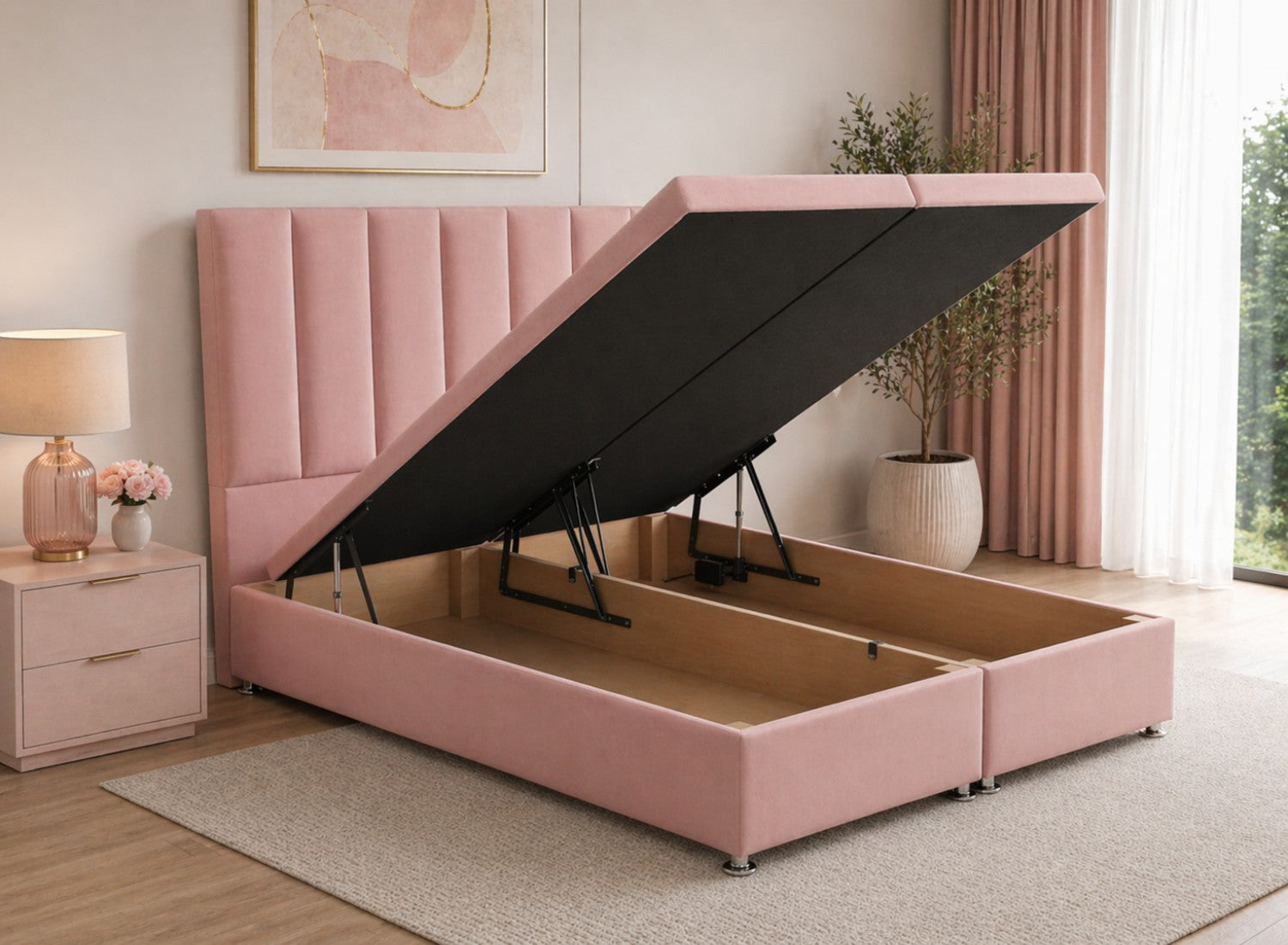 Blush Pink Velvet Single Ottoman Bed with a tall, fluted headboard, open to reveal storage.